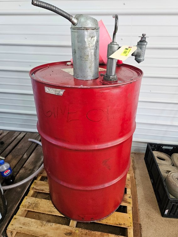 Metal Drum with Oil and Hand Pump, Approx. 3/4 Full