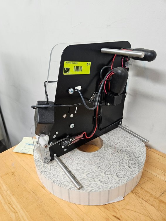 Labeling Machine Attachment with Labels