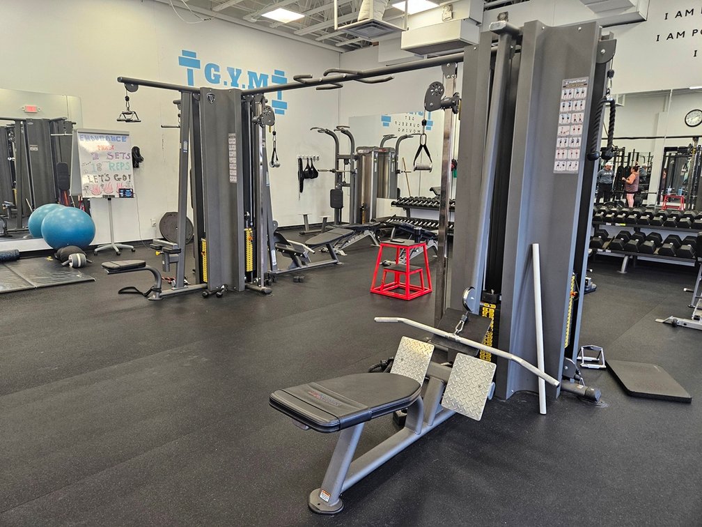 TuffStuff Fitness International6 Station/Cable Crossover with Related Bars, Handles and Additional Weights