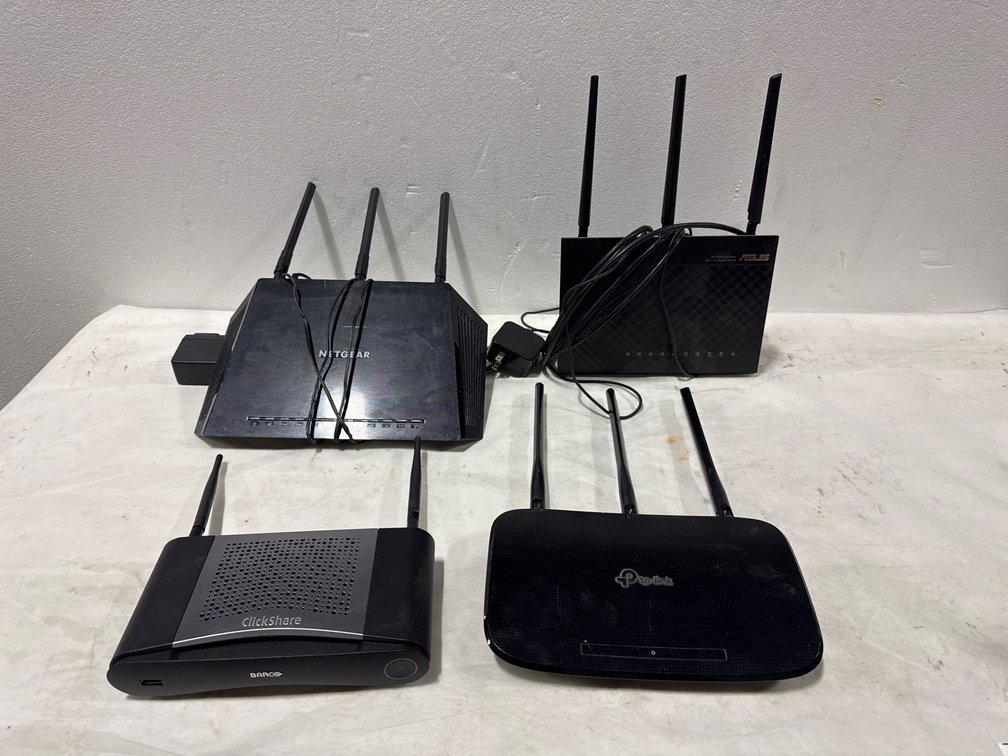 (4) Wi-Fi Routers and Barco ClickShare Base Unit
