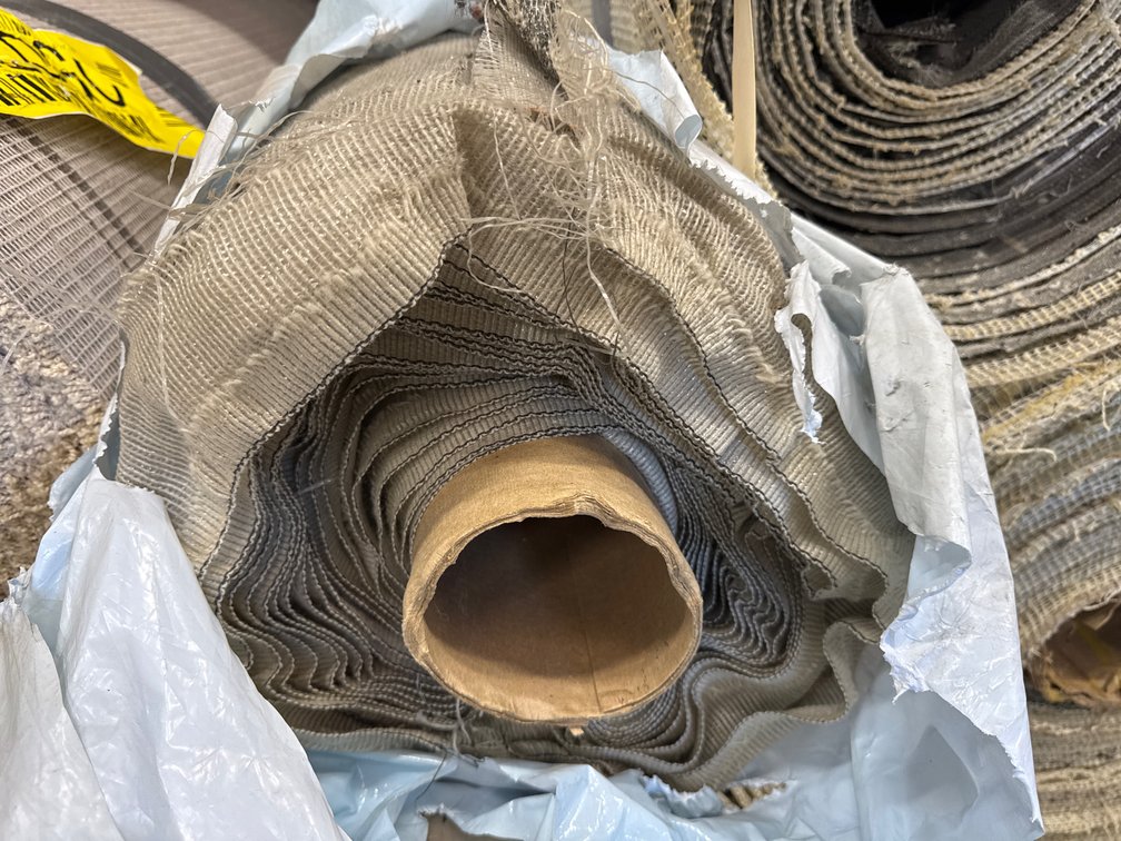 Roll of Multi-Color Loop Pile Carpet on Cardboard Core