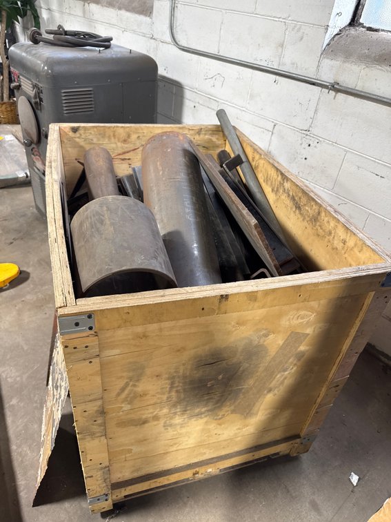 Steel Stock Drops, Cutoffs, Plates, and Pipe Sections in Wooden Crate