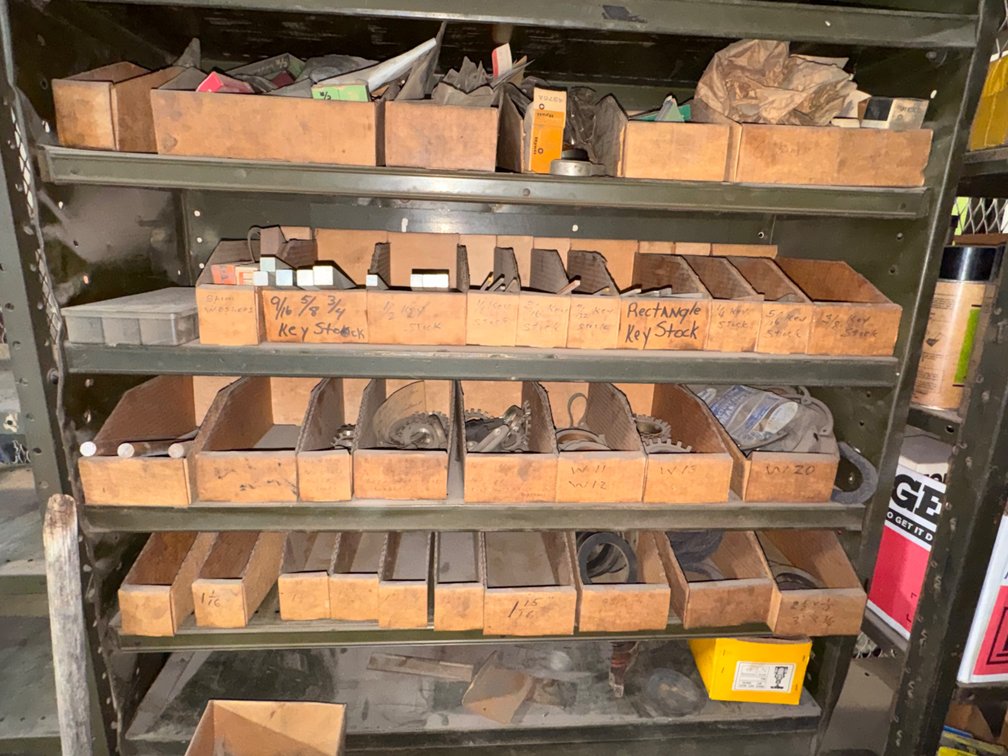 Industrial Metal Shelving Unit with Key Stock, Bearings, and Hardware