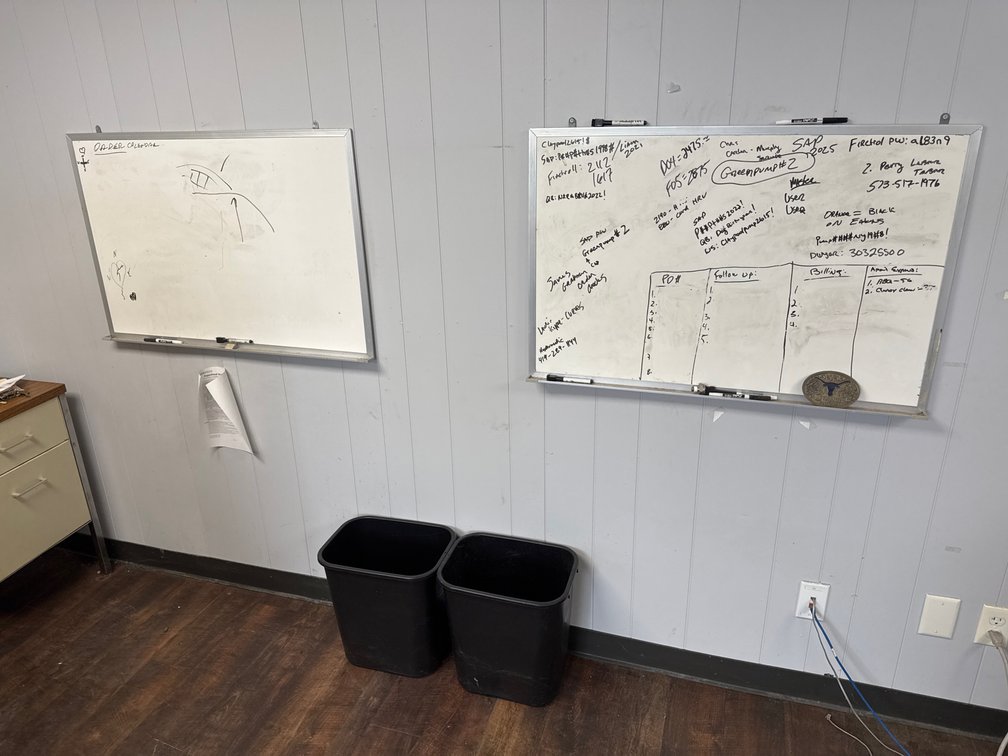 Wall-Mounted Dry-Erase Whiteboards and Plastic Wastebaskets