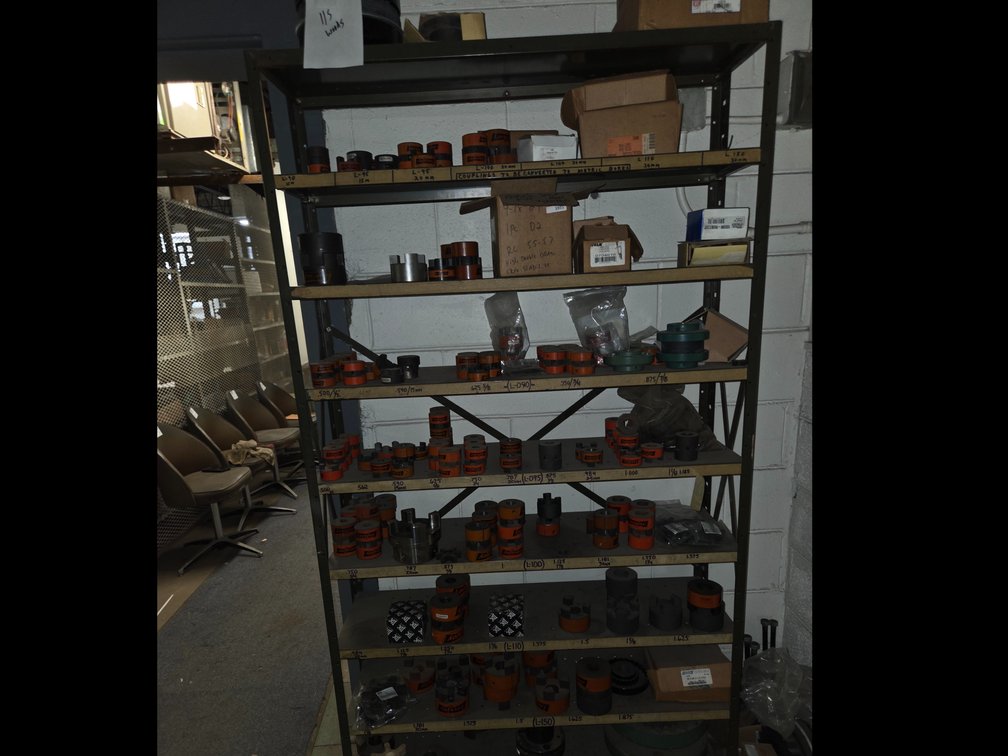 Flexible Shaft Couplings, Hubs, Flanges, and Storage Shelving Lot