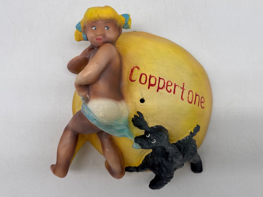 Vintage chalkware string holder "The Coppertone Girl"