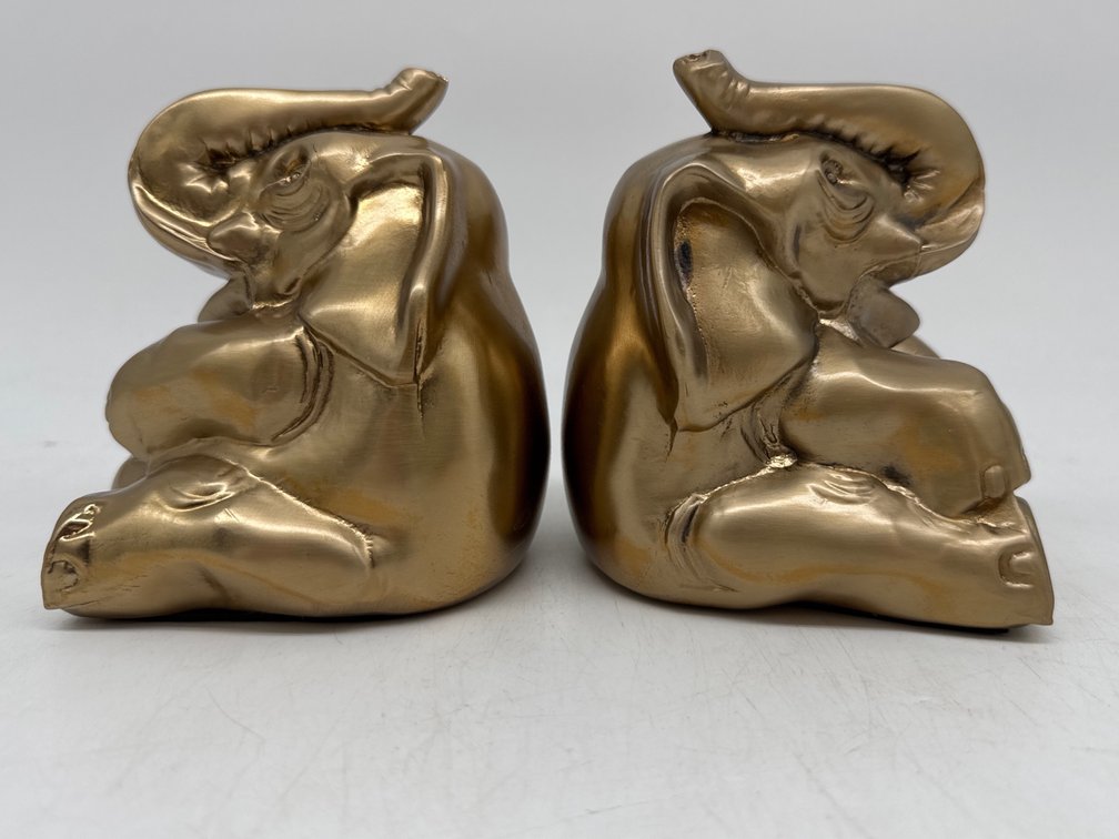 Pair of brass toned elephant bookends