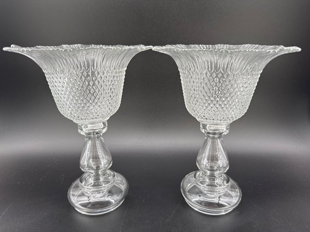 Pair of early pressed glass candleholders; GR
