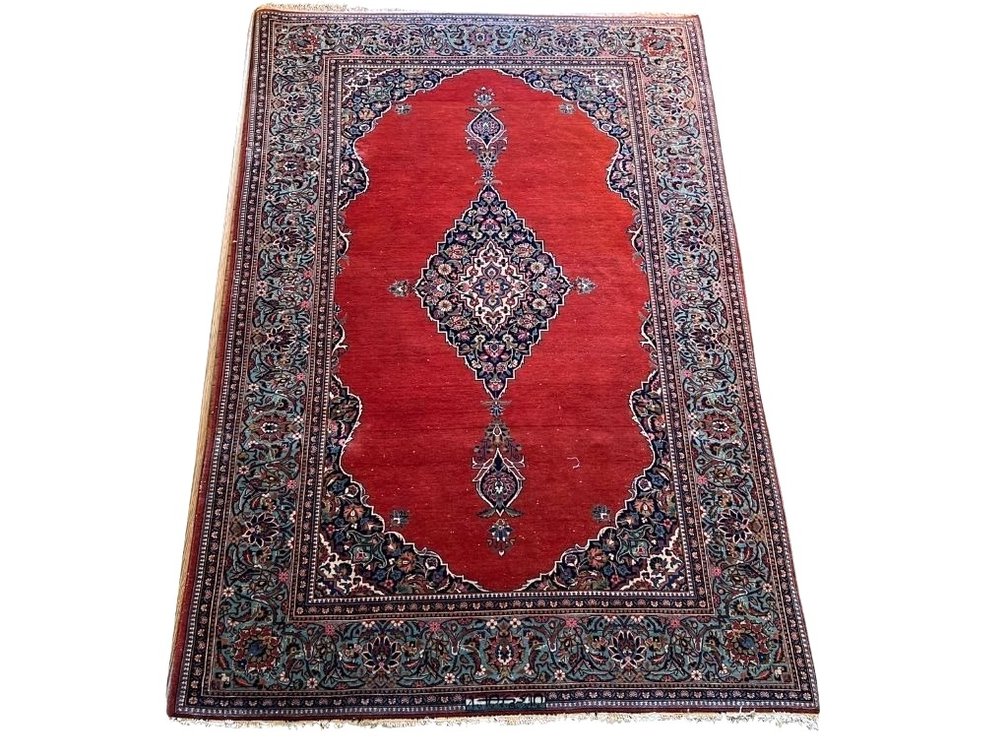Signed Kashan Manchester wool area rug; HALL