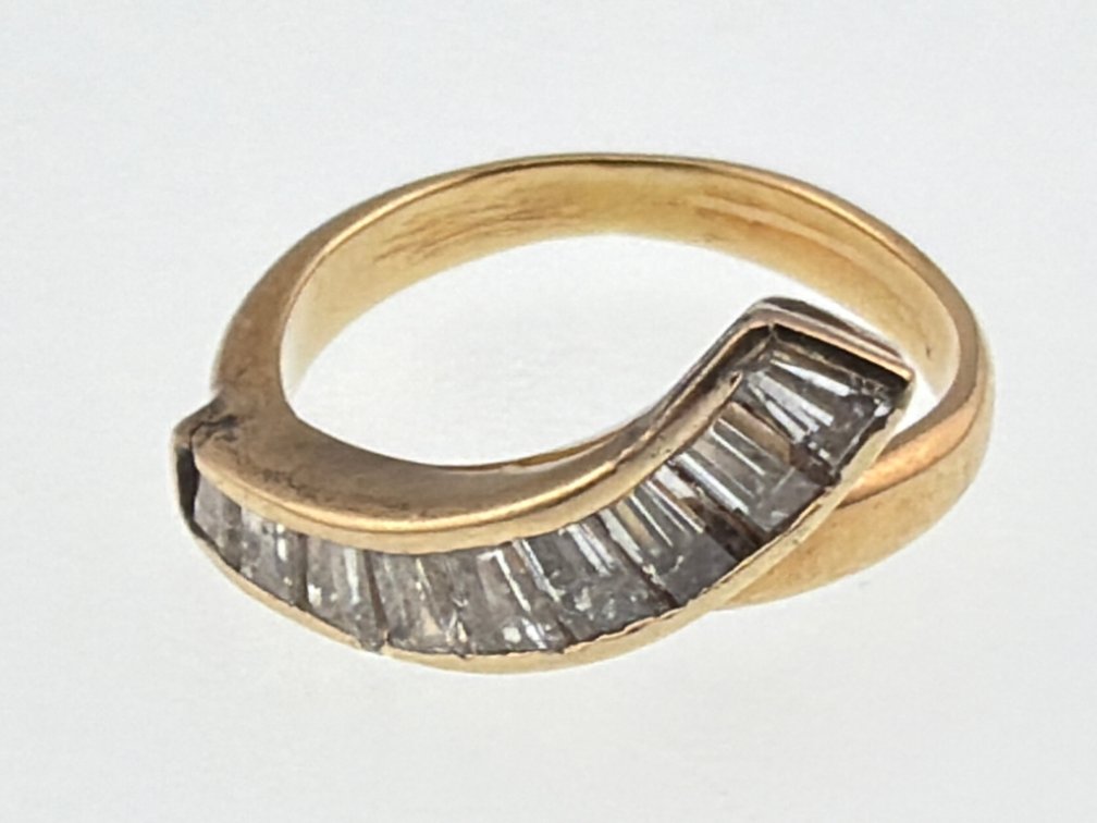 14kt diamond baguette bypass ring