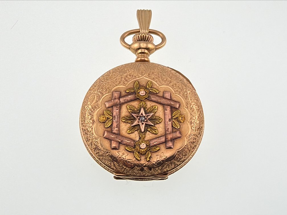 Antique two tone 14kt ladies Elgin pocket watch with diamond