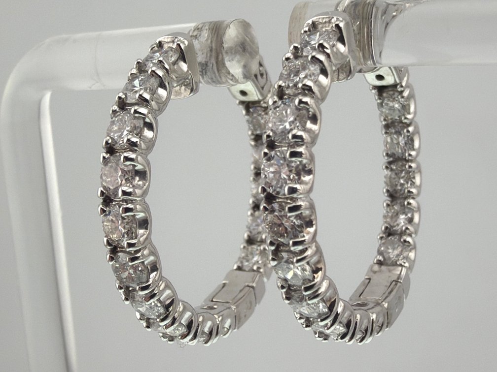 Pair of stunning 14kt white gold and natural diamond hoops (2.5 ctw.)