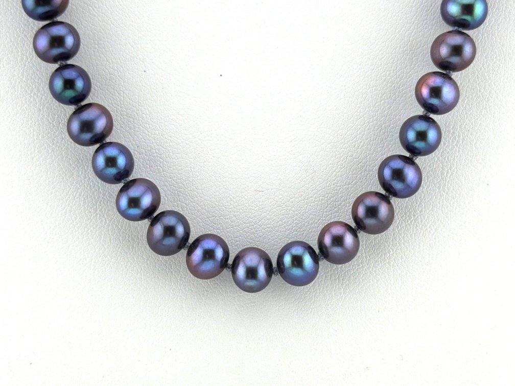 Beautiful strand of Tahitian 7mm pearls with 14kt clasp