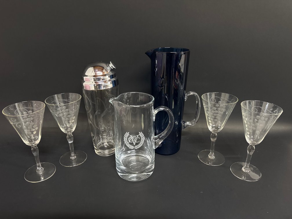 Shaker, wine glasses, pitchers, cocktail books