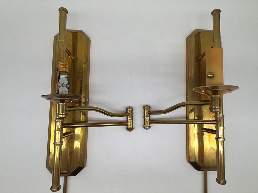 Vintage pair of brass swing arm sconces