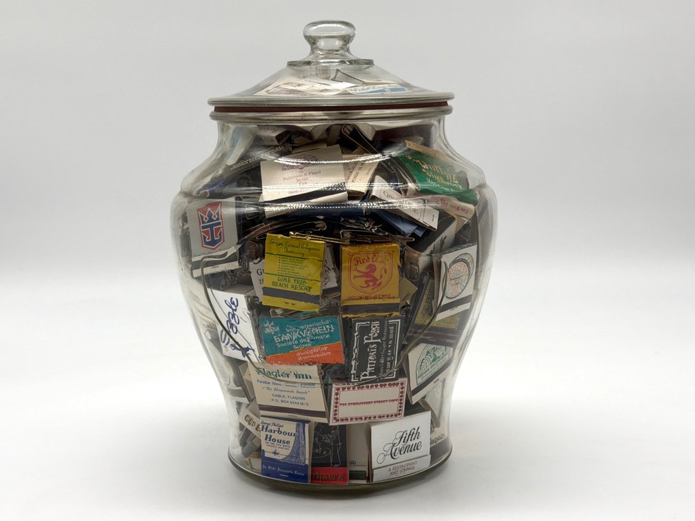 Advertising Squirrel Brand nuts jar full of matchbook collection