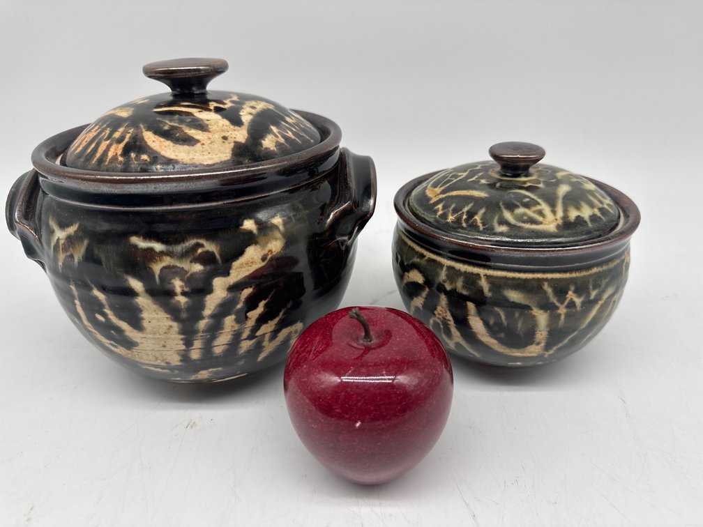 Pair of Rood art pottery lidded graduated jars