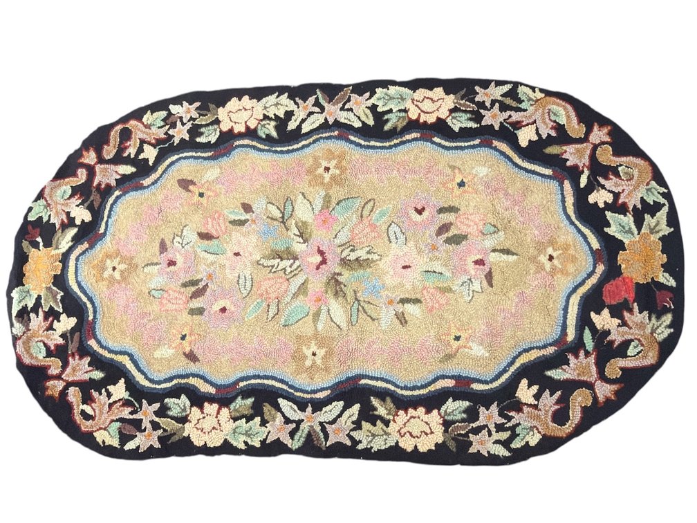Vintage oval hooked rug