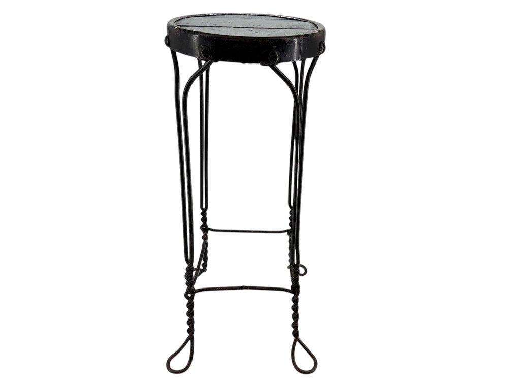 Wrought iron and wood stool