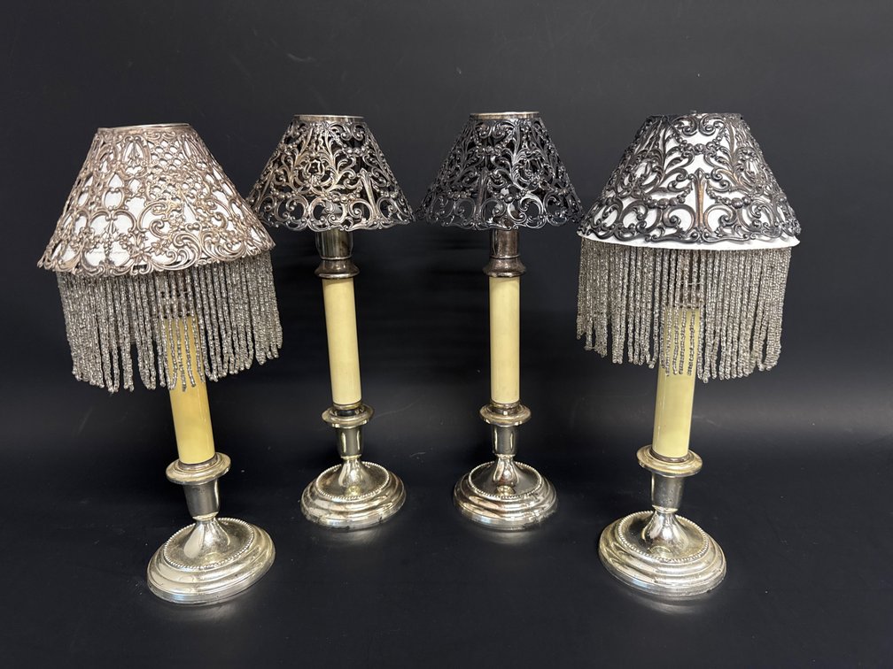 Set of 4 silver plated candle sticks with pierced silver shades