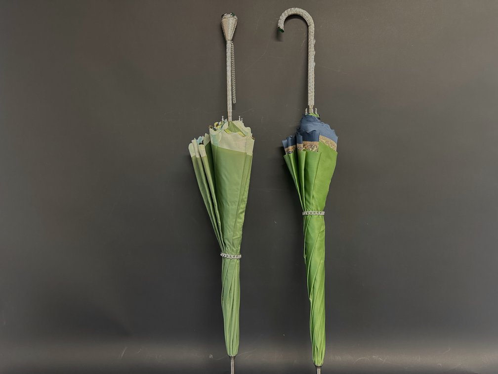 Two Italian fancy umbrellas with bejeweled handles
