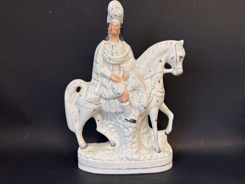 Large antique Staffordshire figural statue of rider on horseback