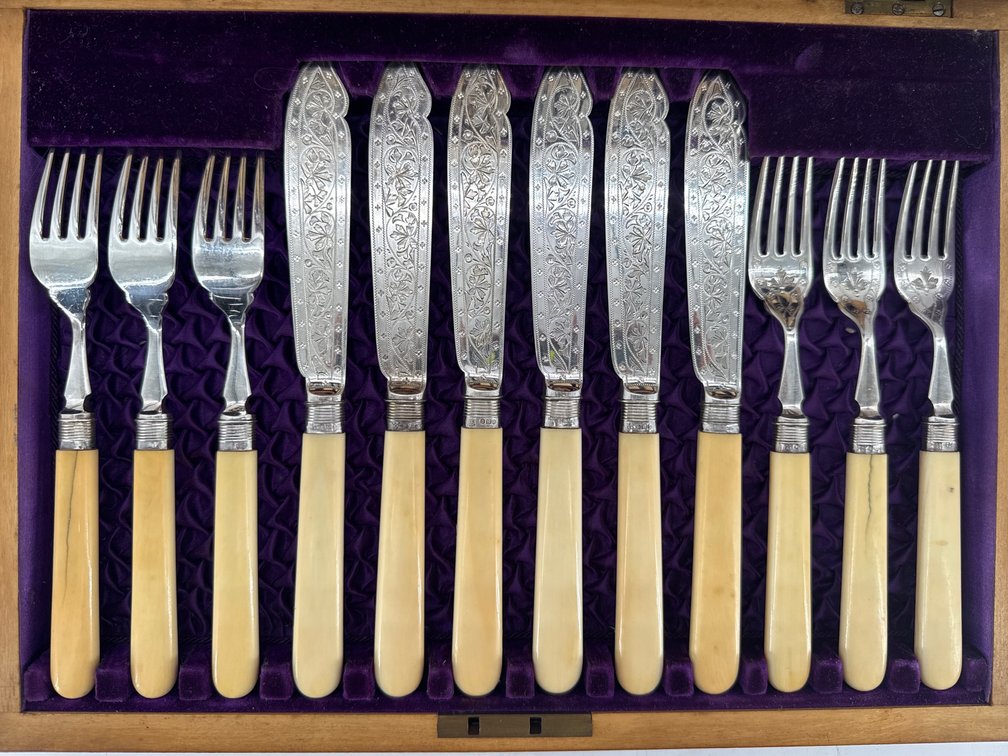 Outstanding English sterling and bone handled fish service for 12 in walnut presentation box
