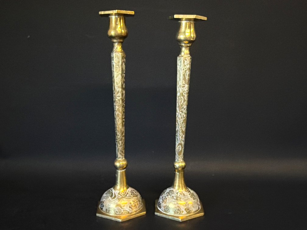 Pair of large brass etched candlesticks
