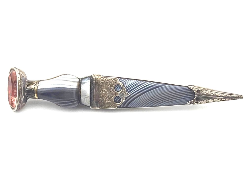 Antique sterling silver and striated glass kilt pin