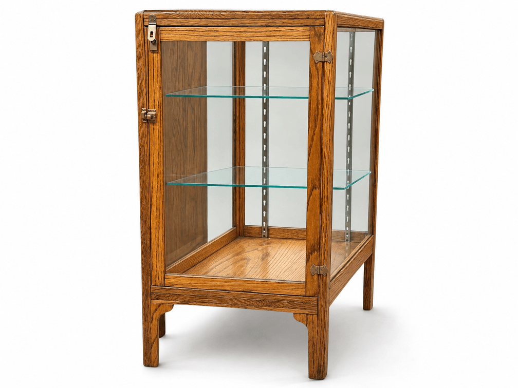 Trapezoid shaped oak antique showcase