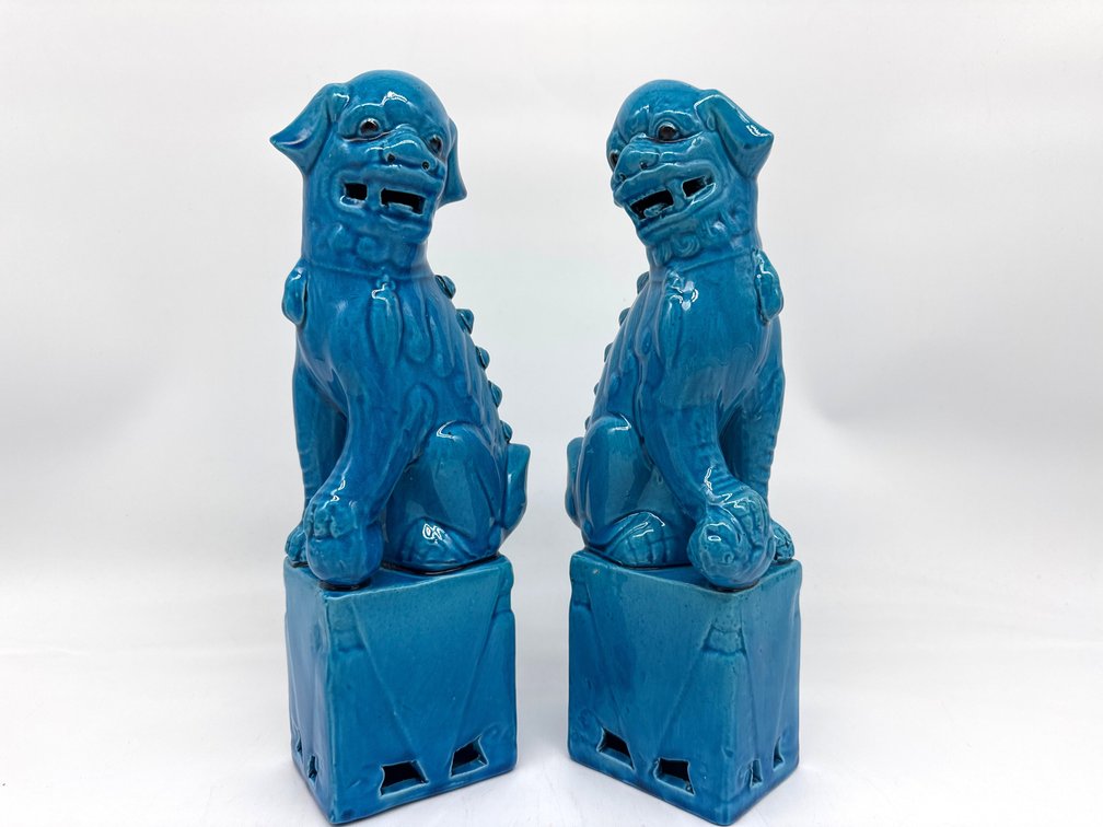 Good looking pair of blue glazed decorative foo dogs