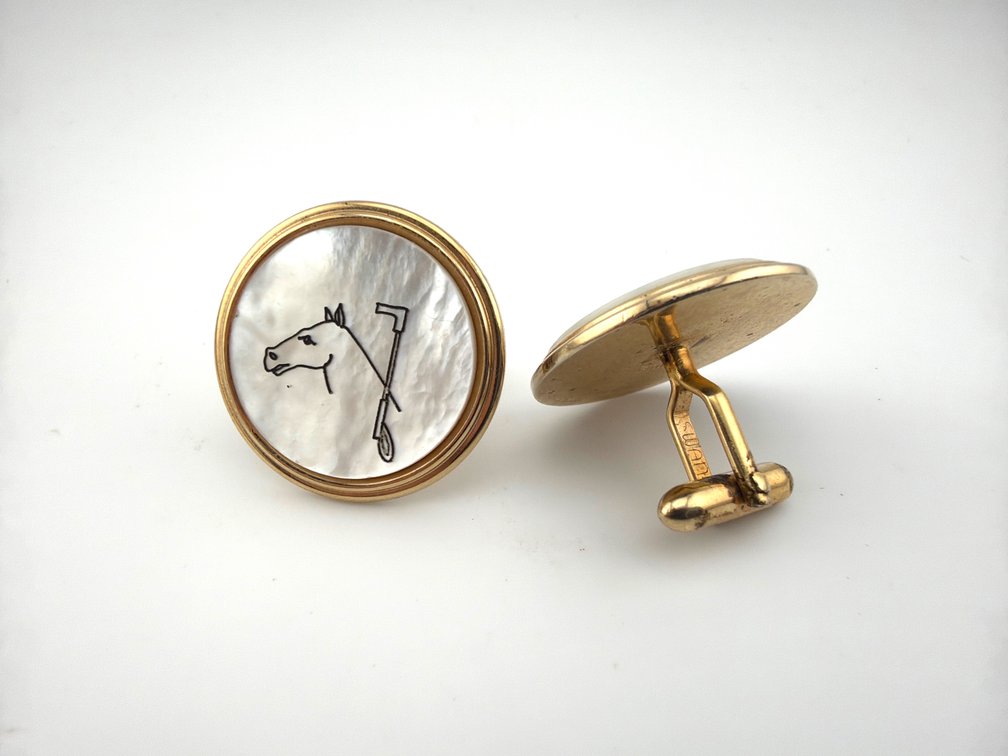 Sharp looking pair of Swank cuff links with horse and crop engraved mother of pearl discs