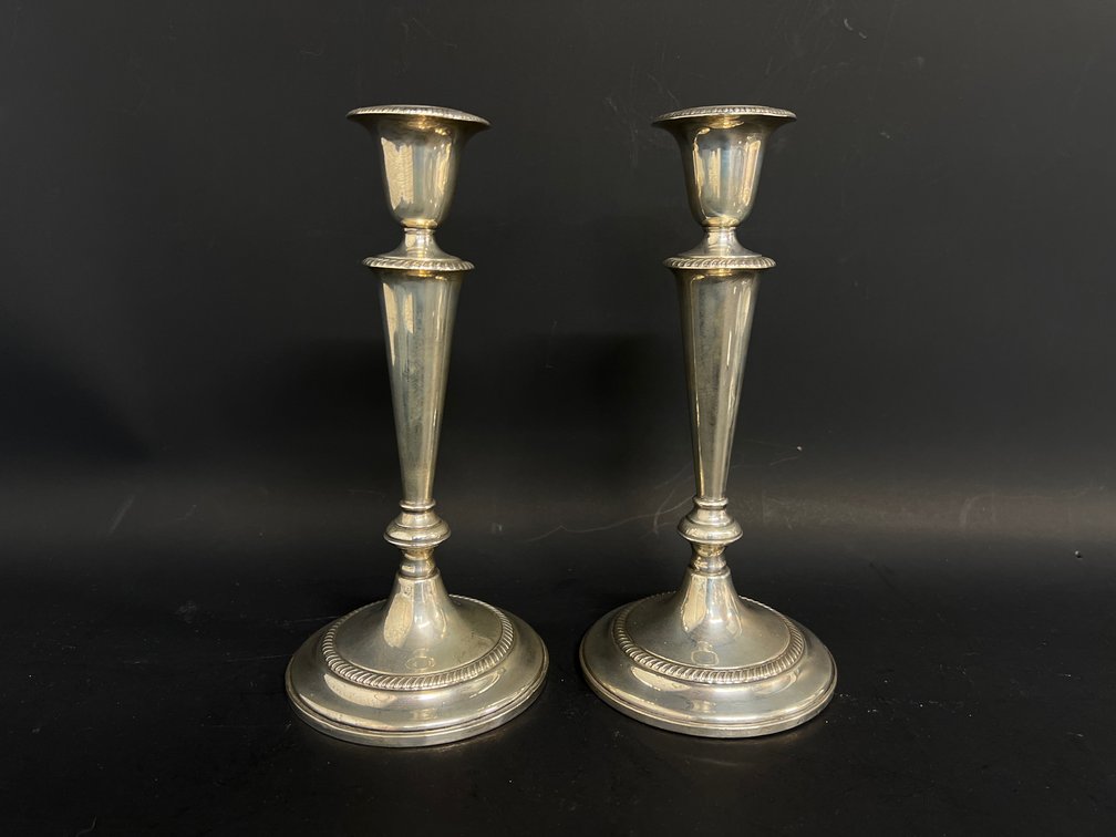 Pair of Fisher sterling silver weighted candlesticks