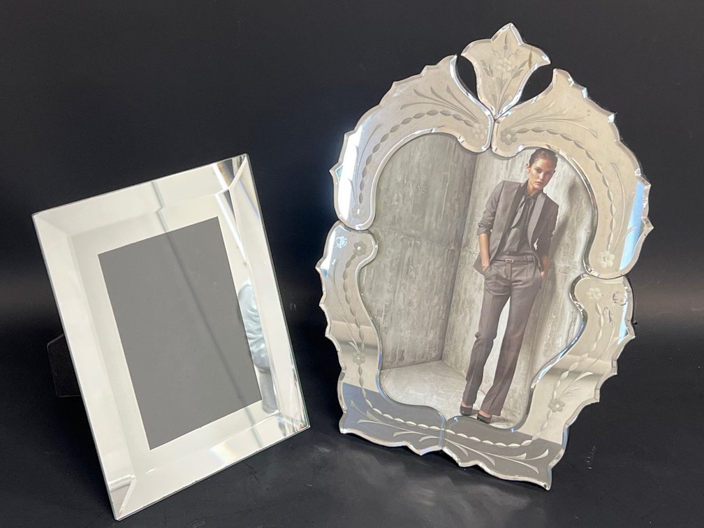 Two mirrored tabletop picture frames
