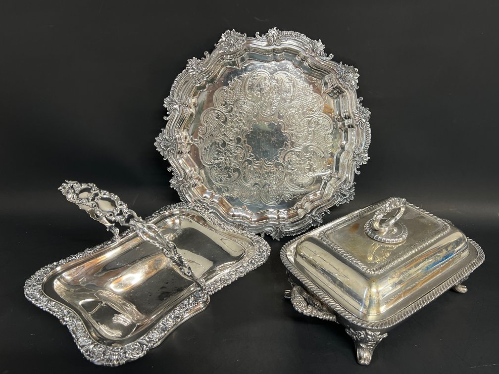Three pieces of ornate silver plated serving pieces