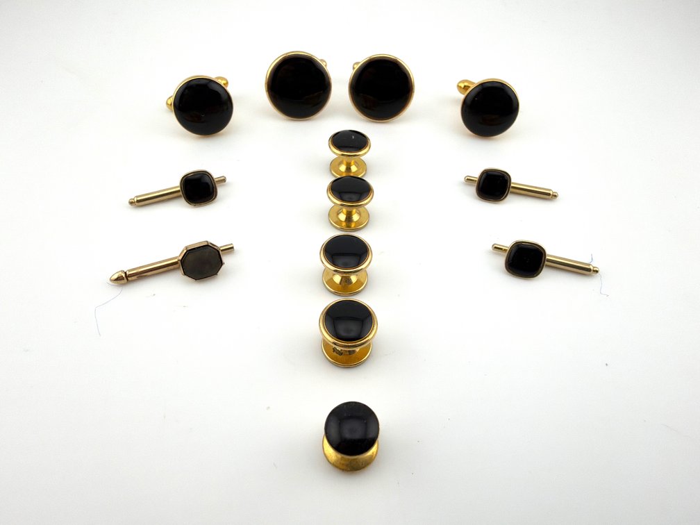 Men's gold tone cuff links and studs