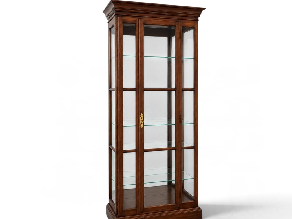 Cherry finish lighted display cabinet by Ethan Allen