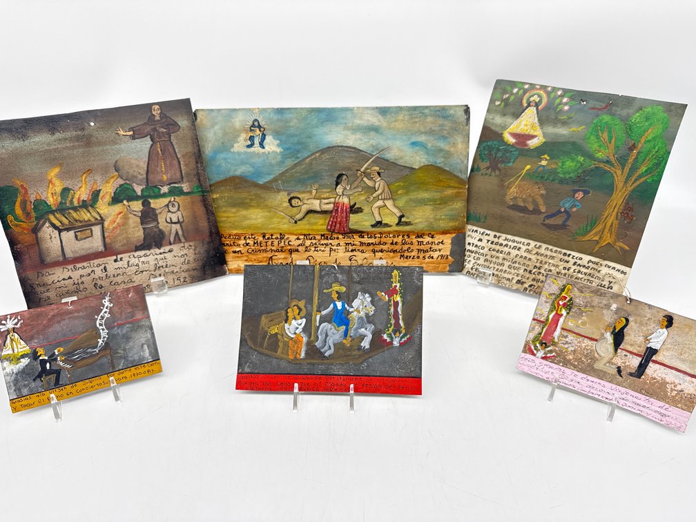 Vintage Mexican paintings on tin