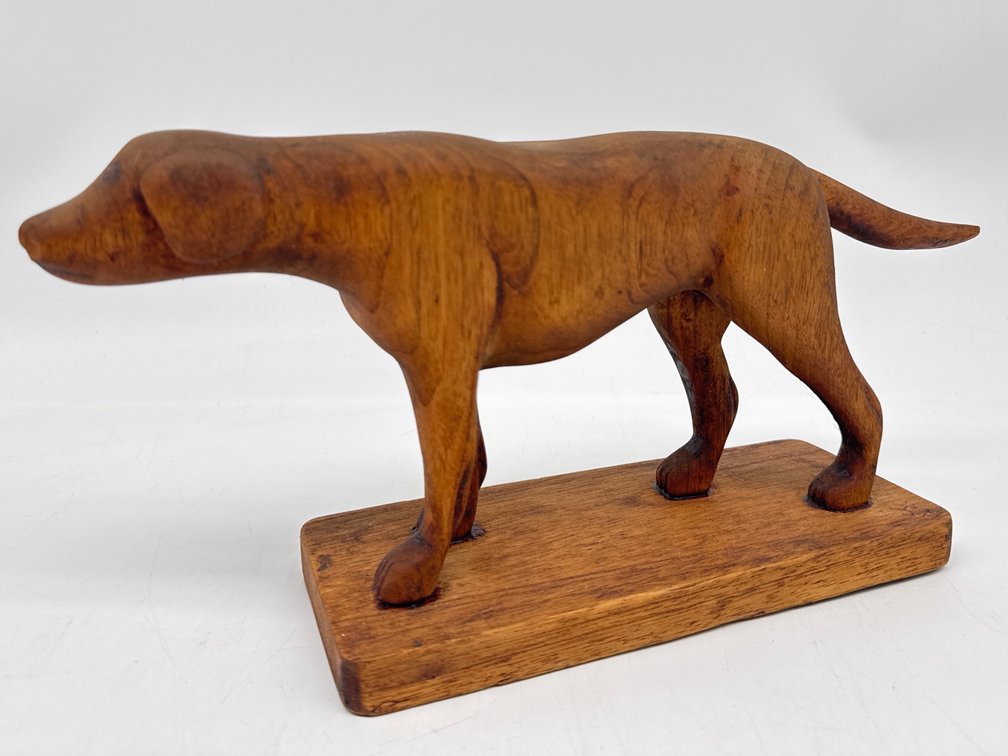 Primitive wood dog figurine