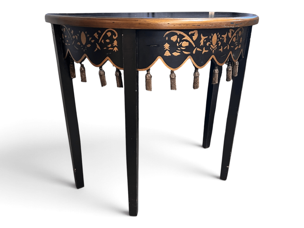 Decorative Sterling Industries painted demilune table with tassel fringe
