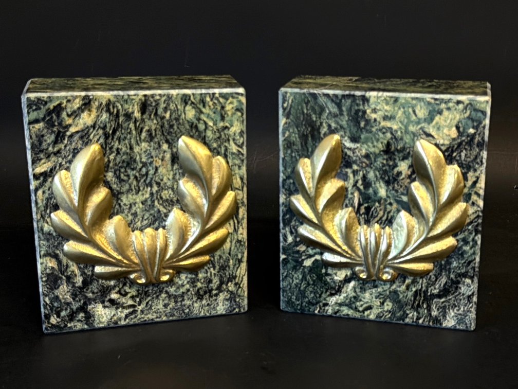 Pair of green marble bookends with brass laurel wreaths