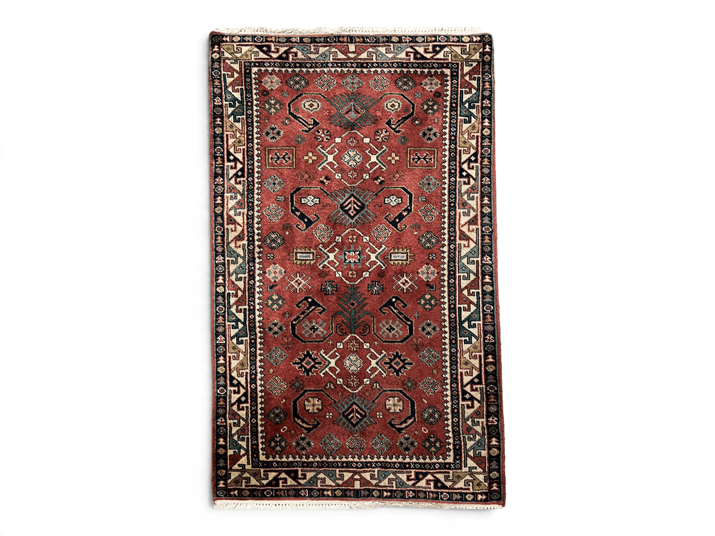 Indian wool pile scatter rug; 37” x 61”