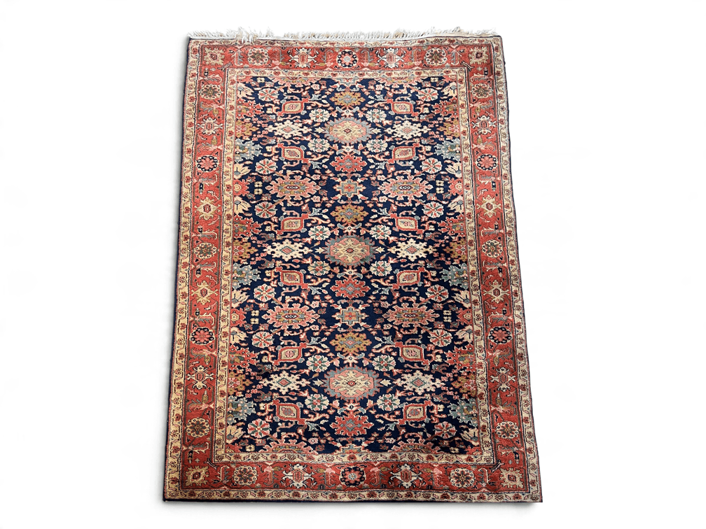 Indian wool pile scatter rug; 64” x 97”