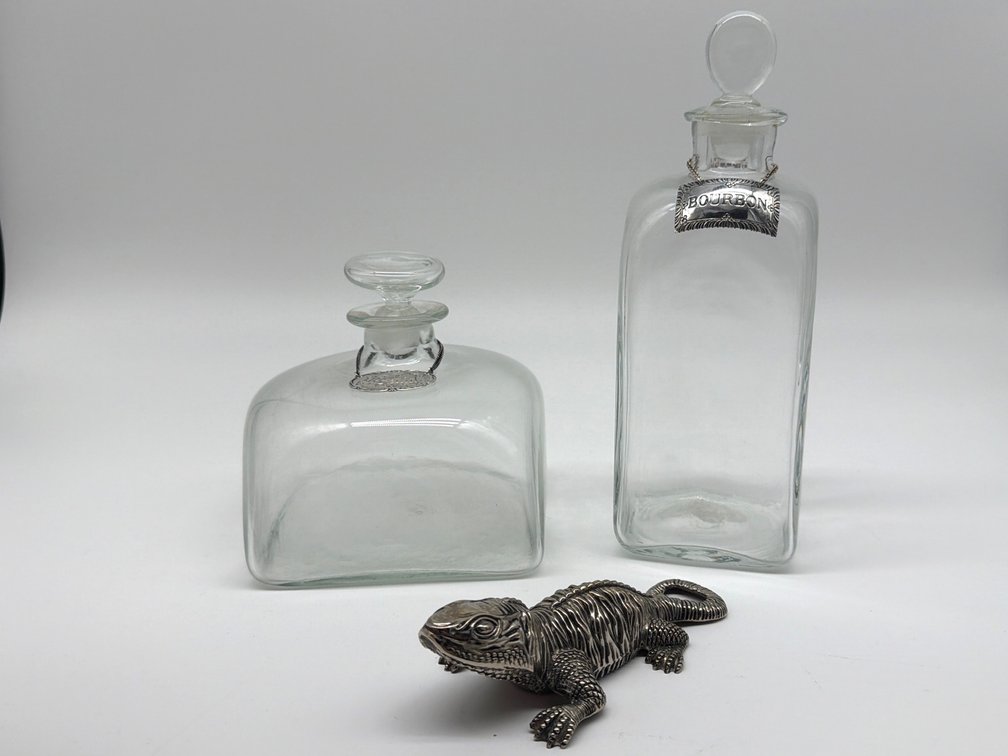 Sterling liquor tags, decanters, bottle opener