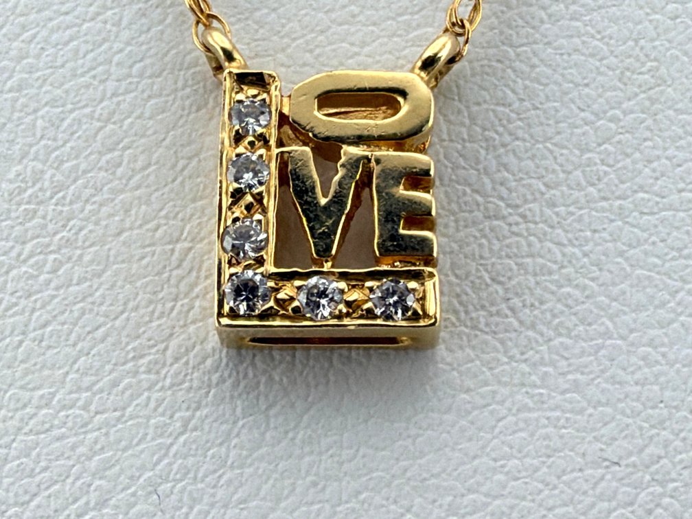 After Robert Indiana 14kt "Love" diamond necklace