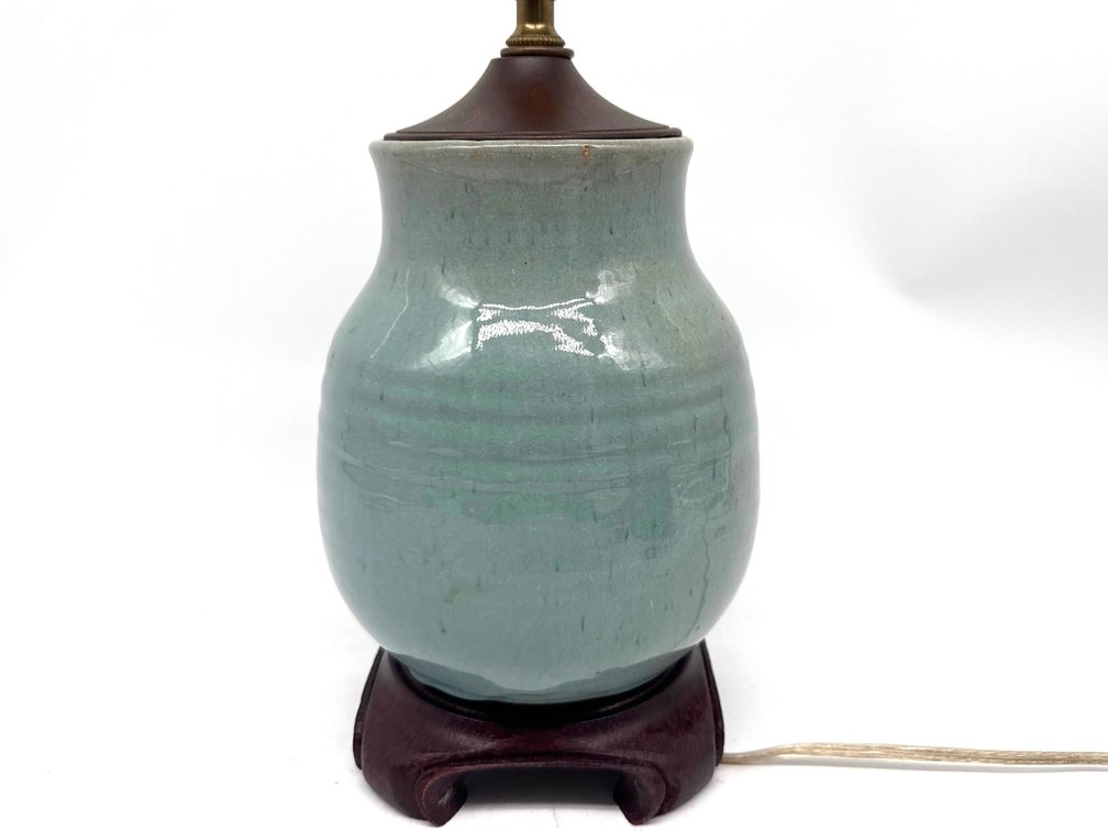 Small blue glazed pottery lamp