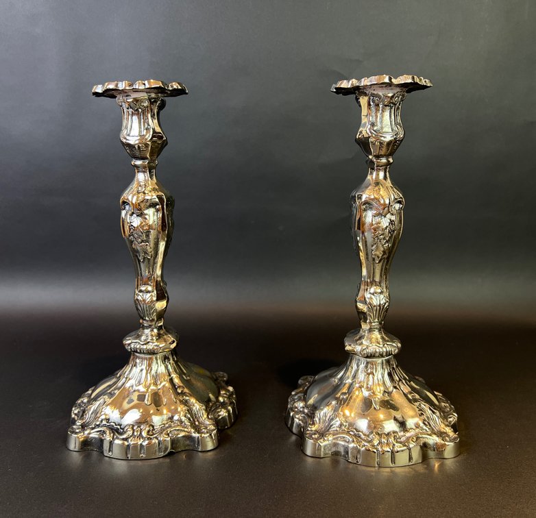 Pair of ornate silver plated candlesticksDR