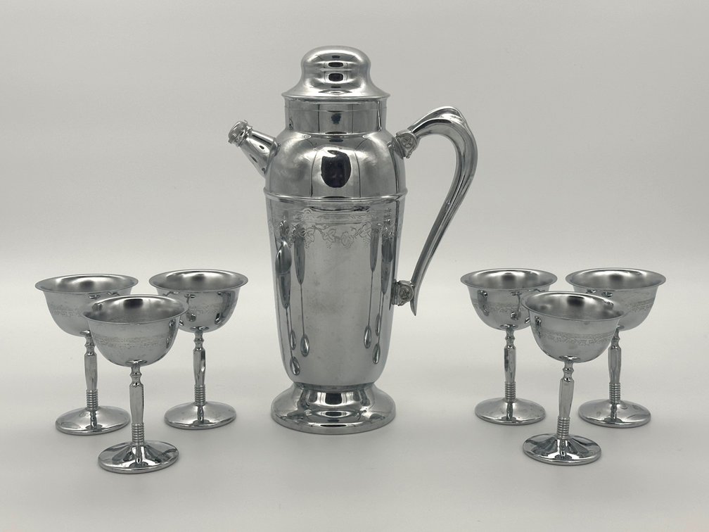 Vintage MCM chrome cocktail shaker with 6 cordials K