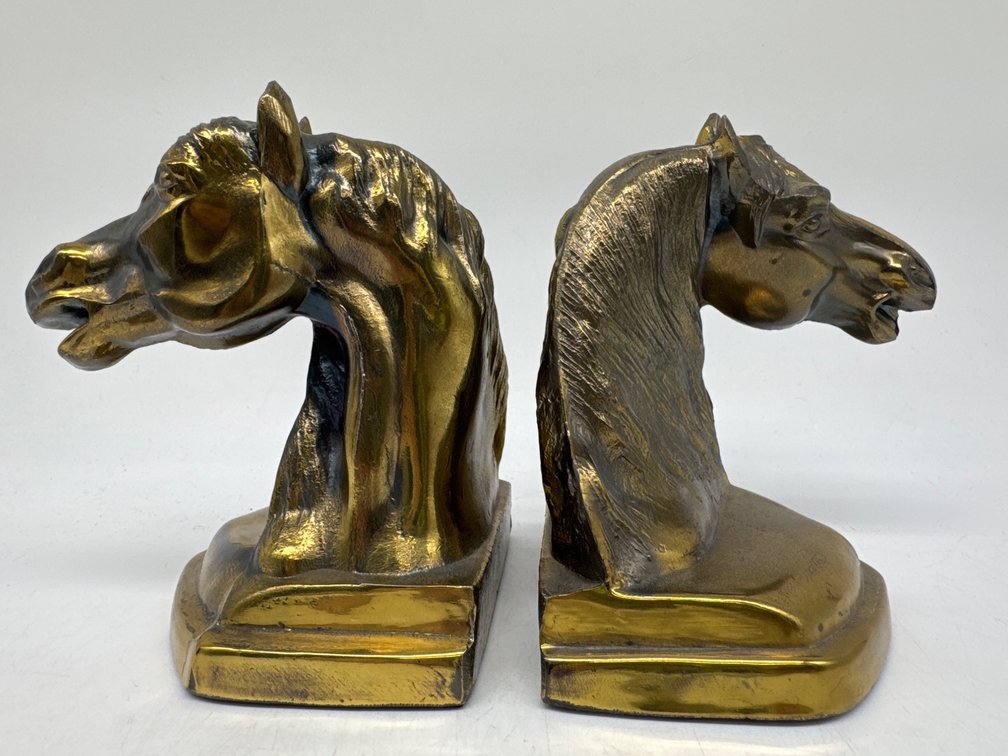 Brass horse head bookends