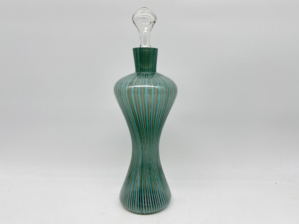 Hand blown blue and gray striped bottle